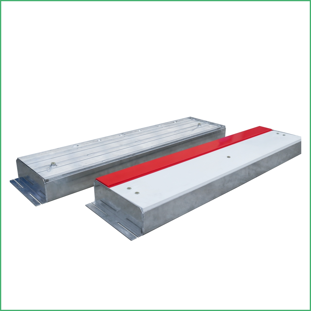 Two galvanized steel loading ramps with grooved surfaces
