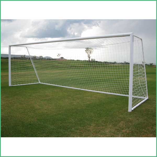 White metal soccer goal with net on a green grass field under a cloudy sky 